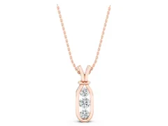 Three-Stone Round Diamond Bezel Pendant Set in Rose gold with Vertical Metal Frame