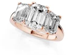 Emerald Cut Diamond Three-Stone Ring Set in Rose gold with Channel-Set Band and Prong Settings
