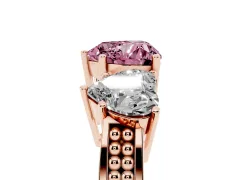 Fancy Pink Heart Cut Diamond Three-Stone Ring Set in Rose gold with Textured Band