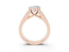 Heart Cut Diamond Solitaire Ring Set in Rose gold with Channel-Set Accent Stones and Prong Setting