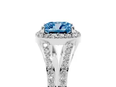 Fancy Blue Cushion Cut Diamond Halo Split Shank Pavé Ring Set in Platinum with Prong Setting