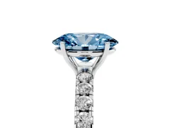Fancy Blue Oval Cut Diamond Pavé Solitaire Engagement Ring Set in White gold with Prong Setting