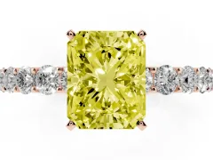 Fancy Yellow Radiant Cut Diamond Solitaire Ring Set in Rose gold with Shared Prong Pavé Band