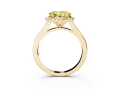 Fancy Yellow Oval Cut Diamond Halo Engagement Ring Set in Yellow gold with Pavé Band and Rising Shoulders