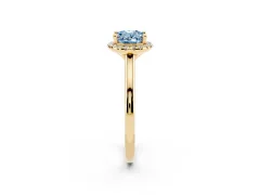 Fancy Blue Oval Cut Diamond Halo Engagement Ring Set in Yellow gold with Pavé Band and Rising Shoulders