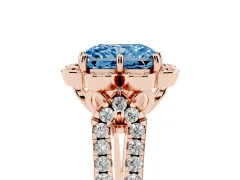 Fancy Blue Radiant Cut Diamond Floral Halo Split Shank Engagement Ring Set in Rose gold with Pavé Shank
