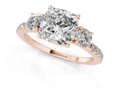 Cushion Cut Diamond Three-Stone Ring Set in Rose gold with Pavé Band and Graduated Sides
