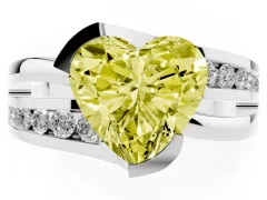 Fancy Yellow Heart Cut Diamond Solitaire Ring Set in White gold with Channel Set Split Shank and Tension Prongs
