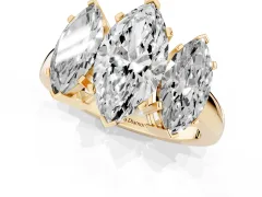 Marquise Cut Diamond Three-Stone Ring Set in Yellow gold with Channel-Set Band and Prong Settings