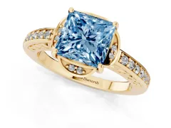 Fancy Blue Princess Cut Diamond Halo Ring Set in Yellow gold with Channel Set Band and Prong Setting