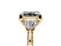 Fancy Green Emerald Cut Diamond Three-Stone Ring Set in Yellow gold with Pavé Band and Smaller Side Stones