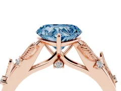 Fancy Blue Heart Cut Diamond Solitaire Ring Set in Rose gold with Leaf Motif Band