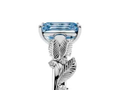 Fancy Blue Emerald Cut Diamond Solitaire Ring Set in Silver with Leaf Motif Band