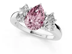 Fancy Pink Pear Cut Diamond Three-Stone Ring Set in White gold with Bold Center and Classic Band