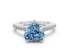 Fancy Blue Heart Cut Diamond Solitaire Ring Set in Platinum with Brilliant Pavé Band and Prong Setting
