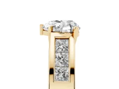 Heart Cut Diamond Solitaire Ring Set in Yellow gold with Channel-Set Accent Stones and Prong Setting