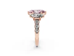 Fancy Pink Marquise Cut Diamond Three-Stone Ring Set in Rose gold with Pavé Band