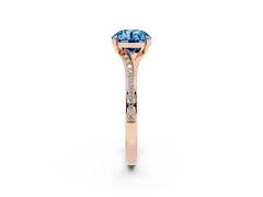 Fancy Blue Round Cut Diamond Solitaire Ring Set in Rose gold with Pavé Accent Band and Classic Prong Setting