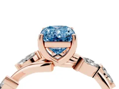 Fancy Blue Radiant Cut Diamond Solitaire Ring Set in Rose gold with Twisted Marquise Accent Band