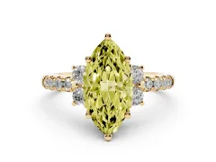 Fancy Yellow Marquise Cut Diamond Three-Stone Pavé Ring Set in Yellow gold with Prong Setting
