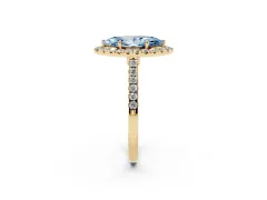 Fancy Blue Marquise Cut Diamond Halo Pavé Engagement Ring Set in Yellow gold with Prong Setting