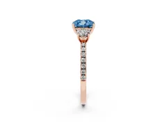 Fancy Blue Cushion Cut Diamond Three-Stone Ring Set in Rose gold with Pavé Band and Graduated Sides