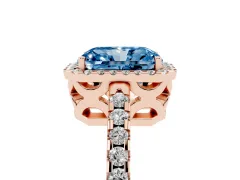 Fancy Blue Radiant Cut Diamond Halo Ring Set in Rose gold with Pavé Shoulders and Halo-Framed Center