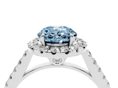Fancy Blue Oval Cut Diamond Pavé Halo Engagement Ring Set in White gold with Pavé Band and Prong Setting