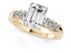 Emerald Cut Diamond Five-Stone Prong Set Engagement Ring Set in Yellow gold with Channel Band