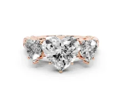 Heart Cut Diamond Three-Stone Ring Set in Rose gold with Braided Band