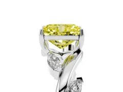 Fancy Yellow Radiant Cut Diamond Solitaire Ring Set in White gold with Twisted Marquise Accent Band