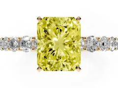 Fancy Yellow Radiant Cut Diamond Solitaire Ring Set in Yellow gold with Shared Prong Pavé Band