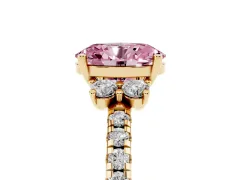 Fancy Pink Oval Cut Diamond Three-Stone Pavé Ring Set in Yellow gold with Prong Setting