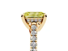 Fancy Yellow Emerald Cut Diamond Solitaire Ring Set in Yellow gold with Brilliant Pavé Band and Prong Setting