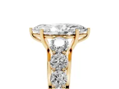 Marquise Cut Diamond Solitaire Ring Set in Yellow gold with Pavé-Set Band and Prong Setting