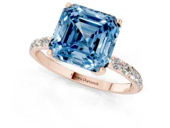 Fancy Blue Asscher Cut Diamond Solitaire Engagement Ring Set in Rose gold with Round Pavé Band and Prong Setting