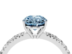 Fancy Blue Oval Cut Diamond Pavé Solitaire Engagement Ring Set in White gold with Prong Setting