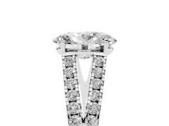 Oval Cut Diamond Split Shank Pavé Engagement Ring Set in Platinum with Prong-Held Center Stone
