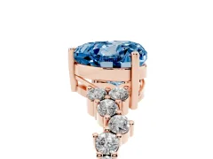 Fancy Blue Heart Cut Diamond Ring Set in Rose gold with Scattered Round Accents