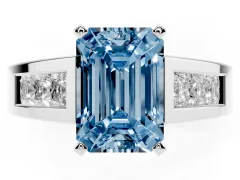 Fancy Blue Emerald Cut Diamond Solitaire Ring Set in White gold with Channel-Set Accent Stones and Prong Setting