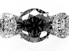Fancy Black Round Cut Diamond Three-Stone Ring Set in Platinum with Textured Band