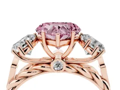 Fancy Pink Heart Cut Diamond Three-Stone Ring Set in Rose gold with Braided Band