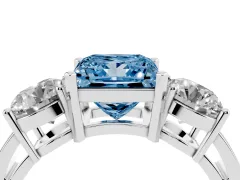 Fancy Blue Princess Cut Diamond Three-Stone Ring Set in Silver with Round Side Stones and Classic Band