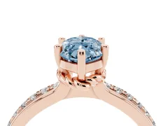 Fancy Blue Marquise Cut Diamond Solitaire Ring Set in Rose gold with Channel Set Band and Prong Setting