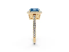 Fancy Blue Asscher Cut Diamond Halo Ring Set in Yellow gold with Pavé Shoulders and Halo-Framed Center