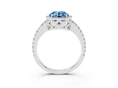Fancy Blue Round Cut Diamond Halo Ring Set in Silver with Pavé Shoulders and Halo-Framed Center