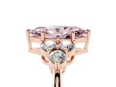Fancy Pink Marquise Cut Diamond Solitaire Ring Set in Rose gold with Cluster Accents on Each Side