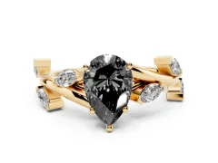 Fancy Black Pear Cut Diamond Solitaire Ring Set in Yellow gold with Twisted Marquise Accent Band