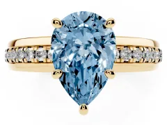 Fancy Blue Pear Cut Diamond Solitaire Ring Set in Yellow gold with Channel Set Band and Prong Setting
