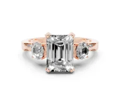 Emerald Cut Diamond Three-Stone Ring Set in Rose gold with Pavé Band and Smaller Side Stones